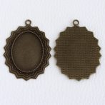  Tibeti stílusú ragasztható fém medál alap - antik bronz színű 55x40mm-es, 35x25mm-es kabosonhoz