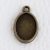 Tibeti stílusú KÉTOLDALAS ragasztható fém medál alap - antik bronz színű 20x13mm-es, 14x10mm-es kabosonhoz